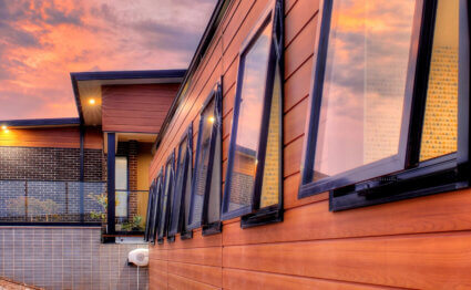 Side of house with DecoClad aluminium cladding and window.