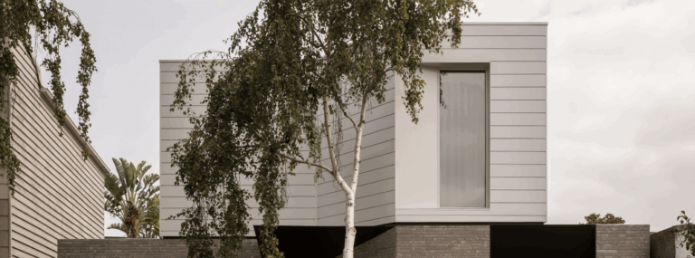 ProjectProfile-Arli Homes- DecoClad_White_Banner